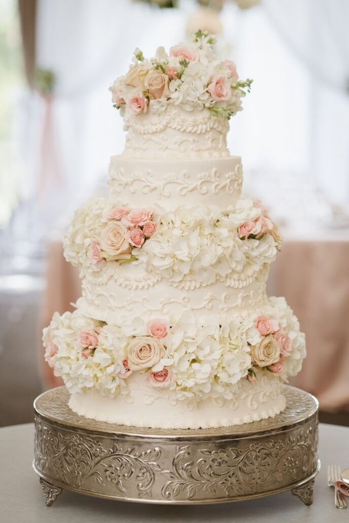 four tier wedding cake at rolling hills country club